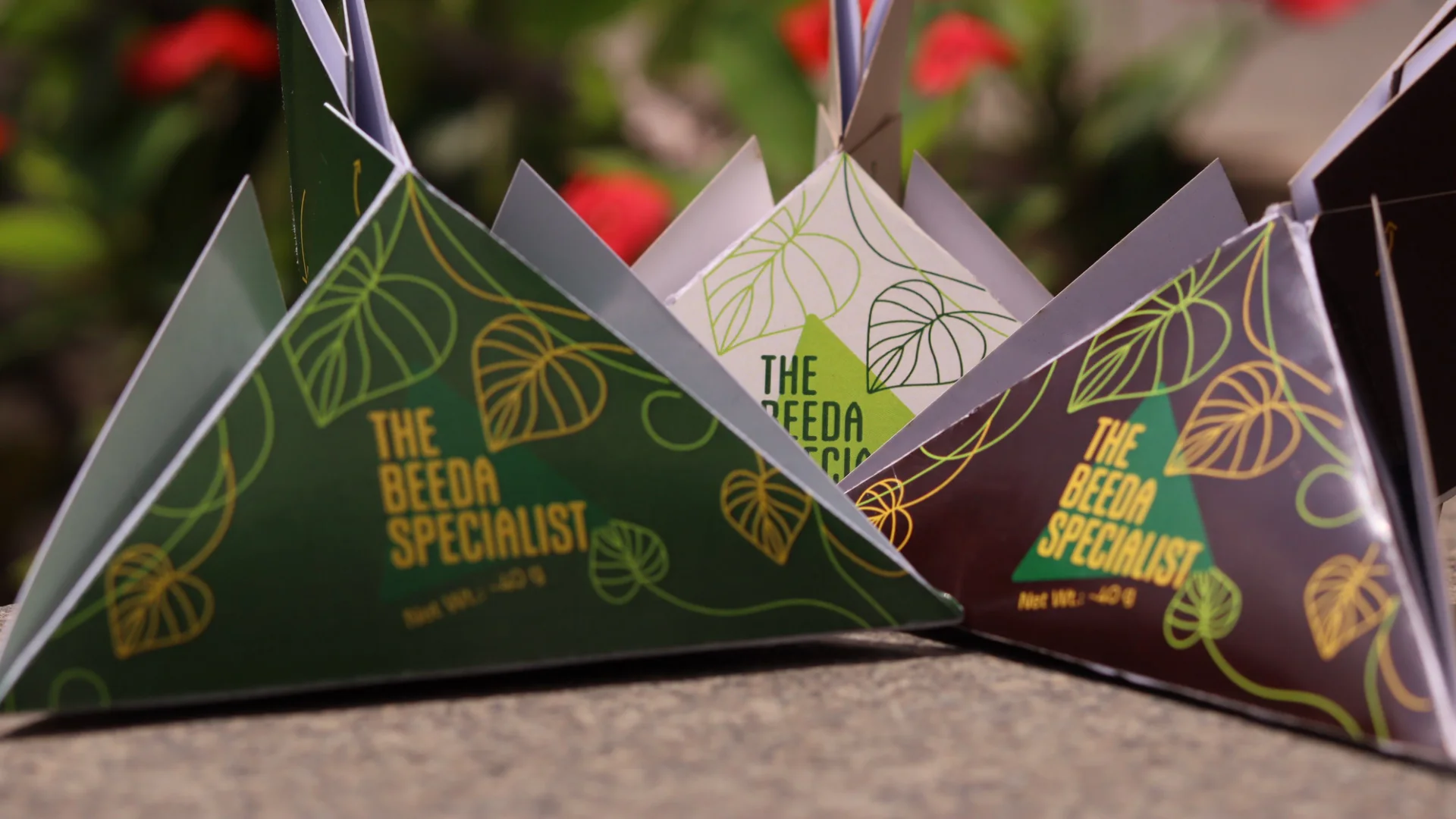 Low view of the three packs in a row, the green Sweet pack in front