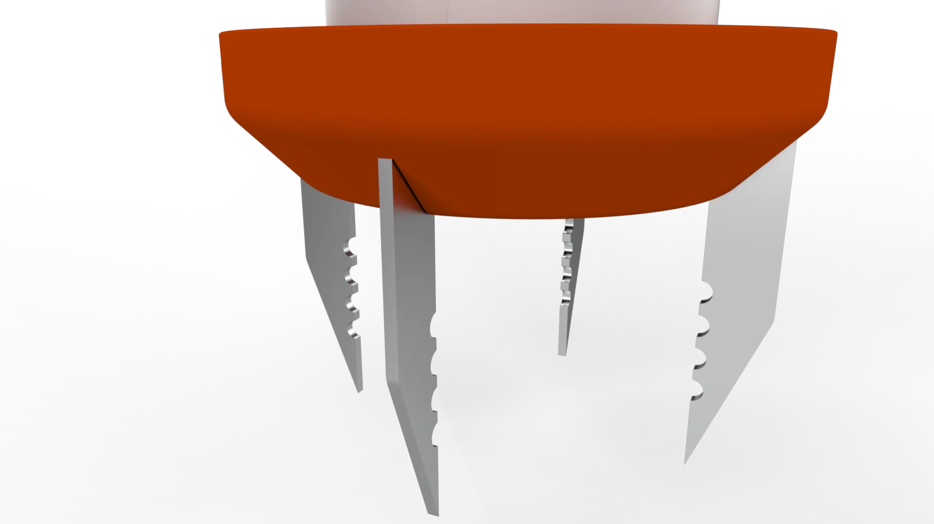 Close-up of serrated metal spikes below the orange base